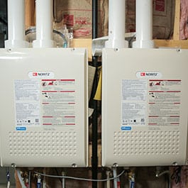 Two tankless propane water heaters