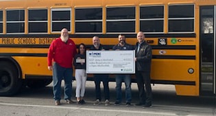 MOPERC check presentation for Liberty school buses